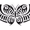 Tribal butterfly with tribal design on either side..