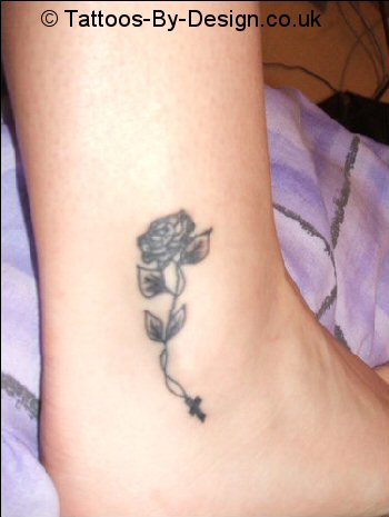 Black rose with little cross